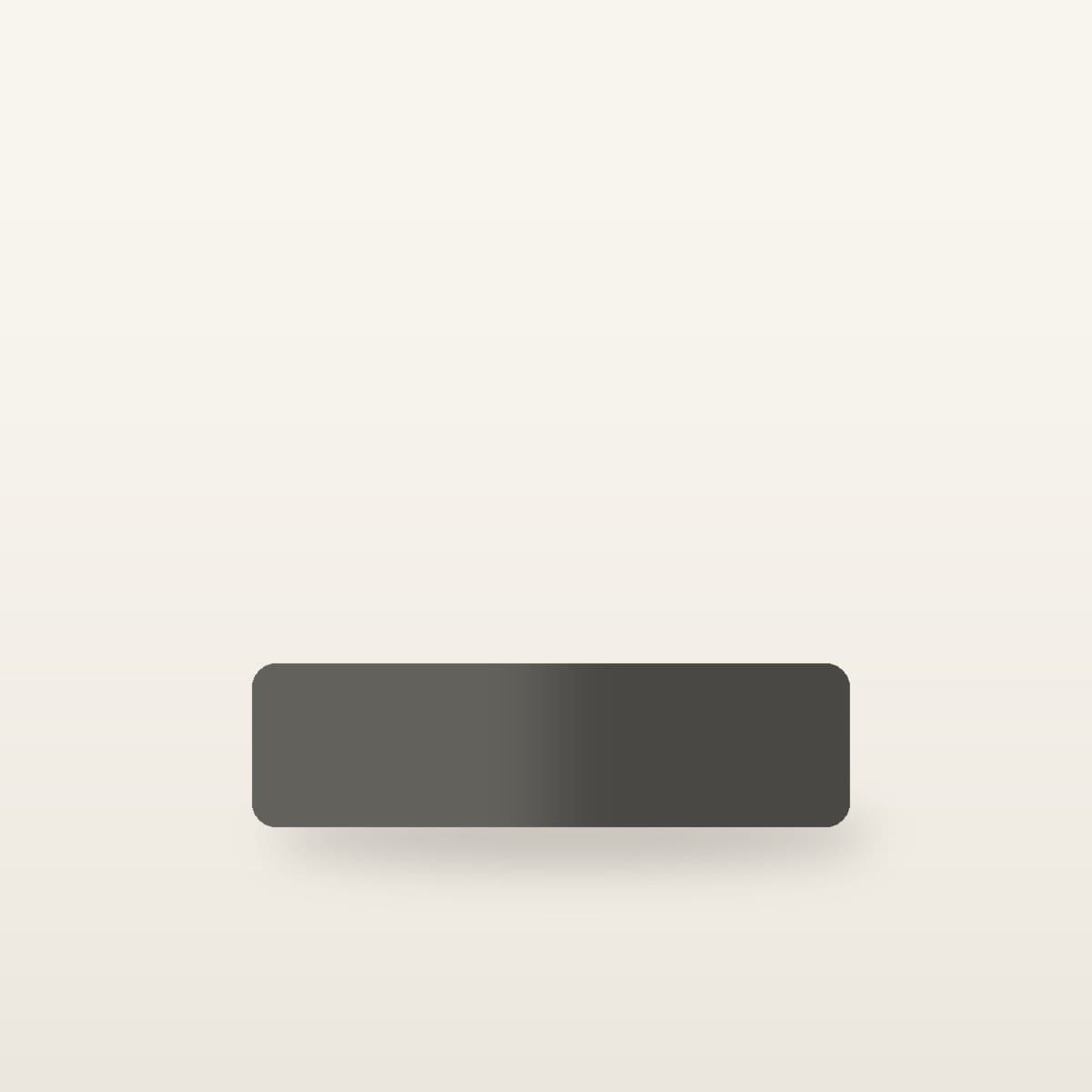 Ishi Phone Dock — minimalist desk object photographed against a plain neutral backdrop